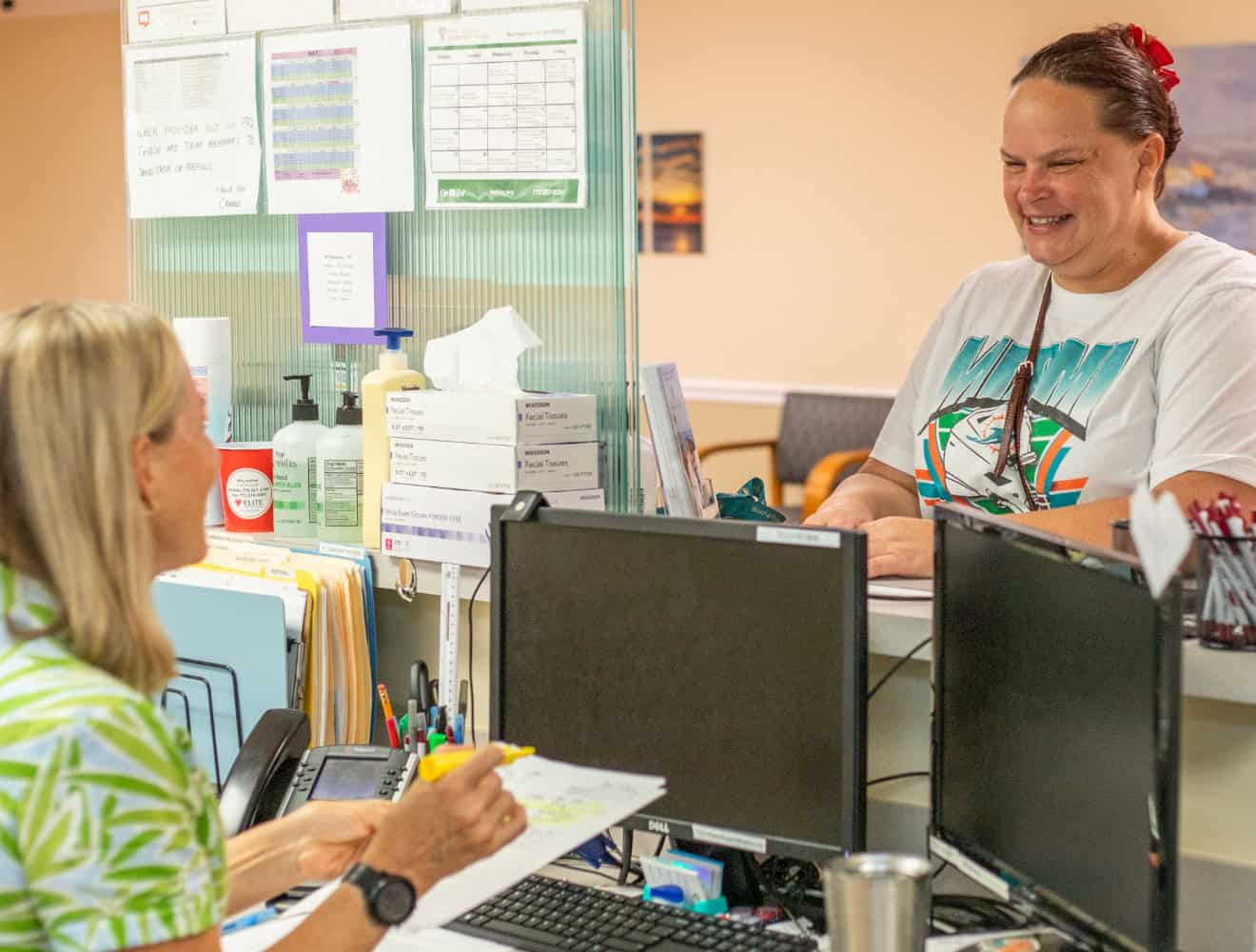 People At Reception Desk